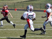 Pint-Sized Football Players Still at Risk for Injuries